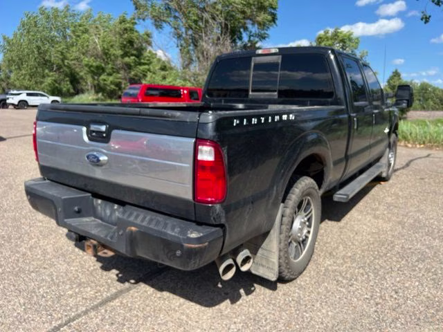 2014 Tuxedo Black Metallic Ford Super Duty F-250 SRW Platinum 4X4 Truck