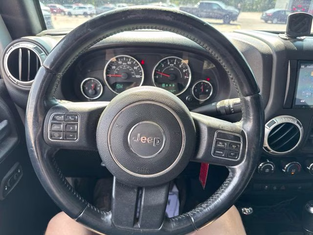 2015 Bright White Clearcoat Jeep Wrangler Unlimited Sahara 4X4 SUV