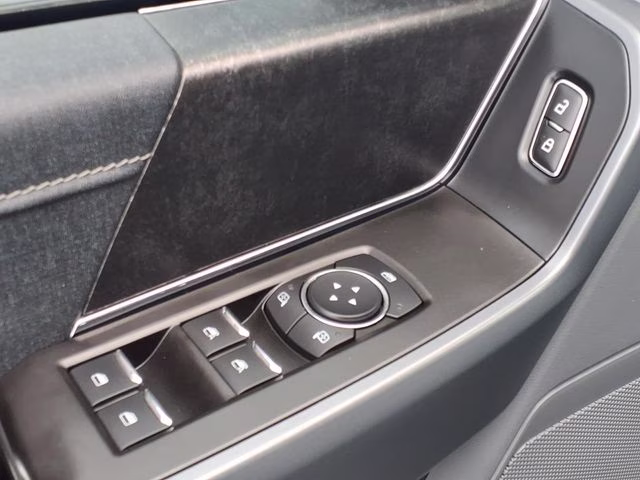 2022 Black Metallic Ford F-150 Lightning XLT AWD Truck