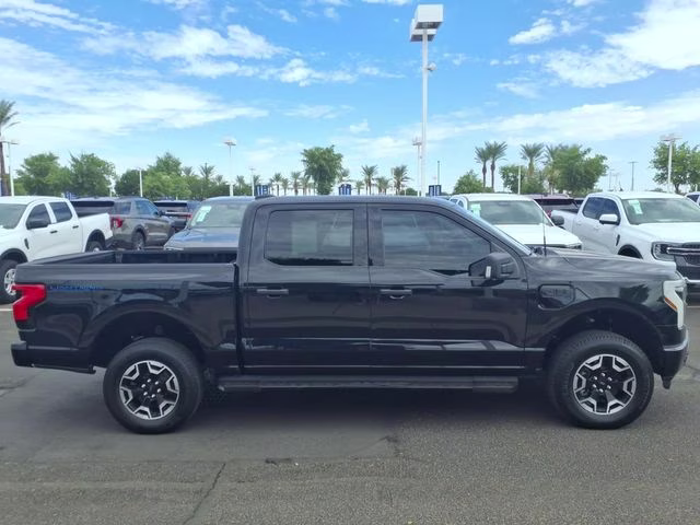 2022 Black Metallic Ford F-150 Lightning XLT AWD Truck