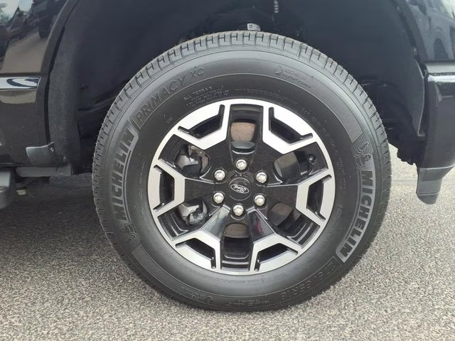 2022 Black Metallic Ford F-150 Lightning XLT AWD Truck