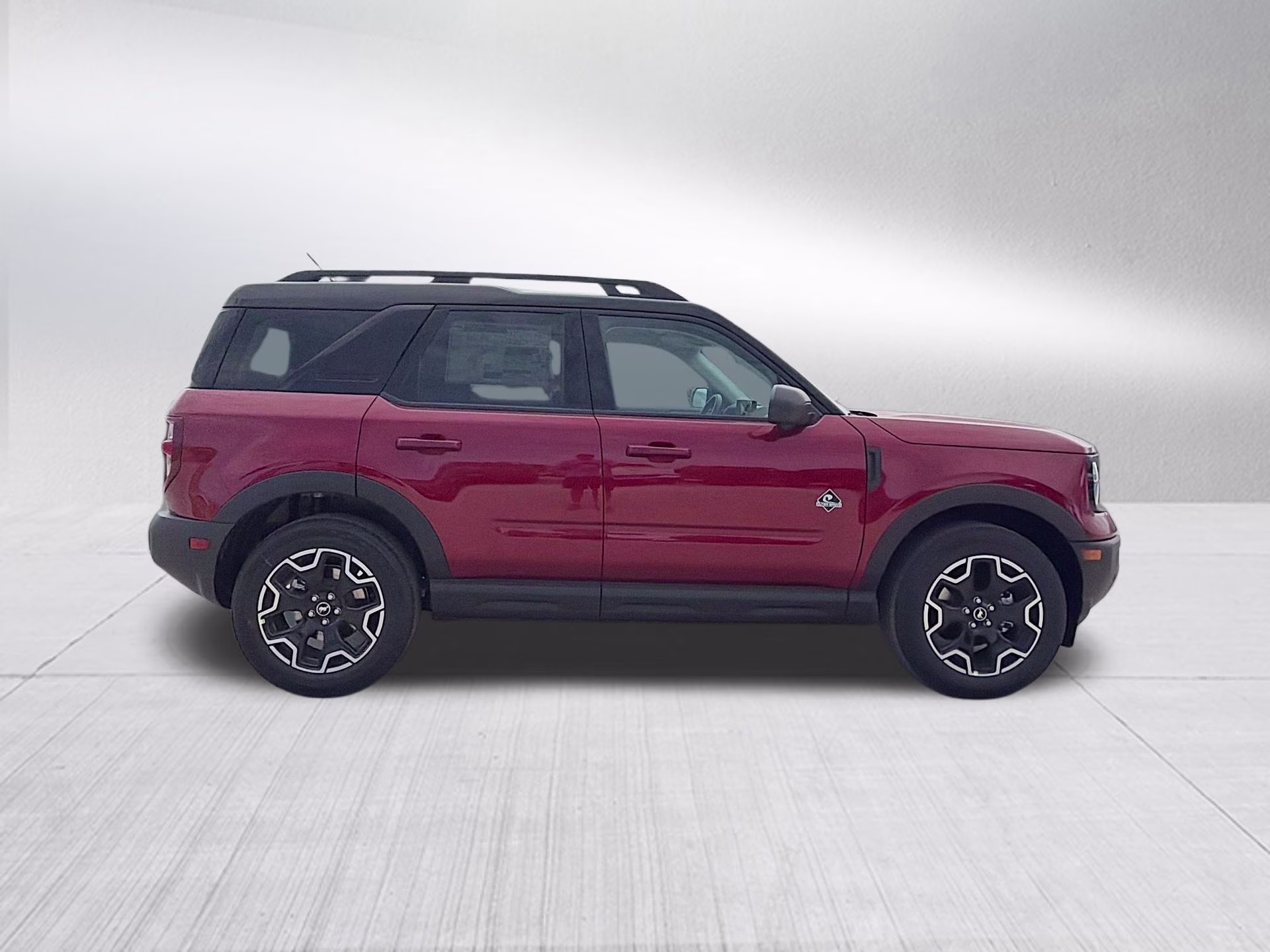 2026 Ruby Red Metallic Tinted Clearcoat Ford Bronco Sport Outer Banks 4X4 SUV