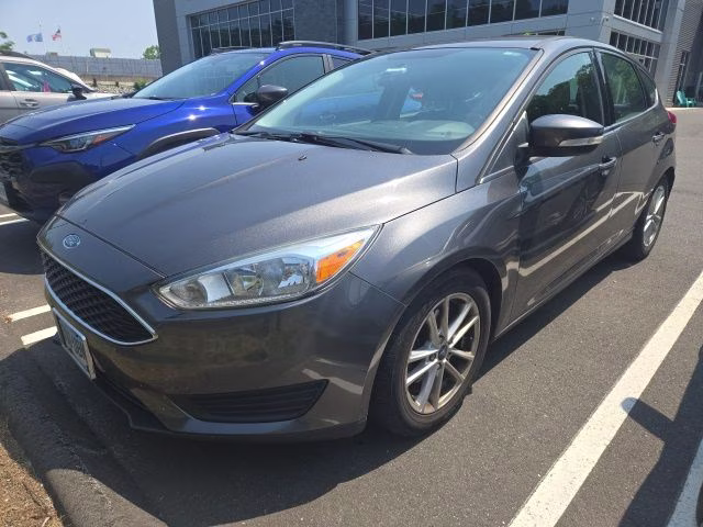 2016 Magnetic Ford Focus SE FWD Hatchback