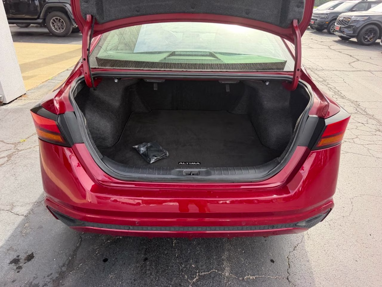 2024 Scarlet Ember Nissan Altima 2.5 SV FWD Sedan