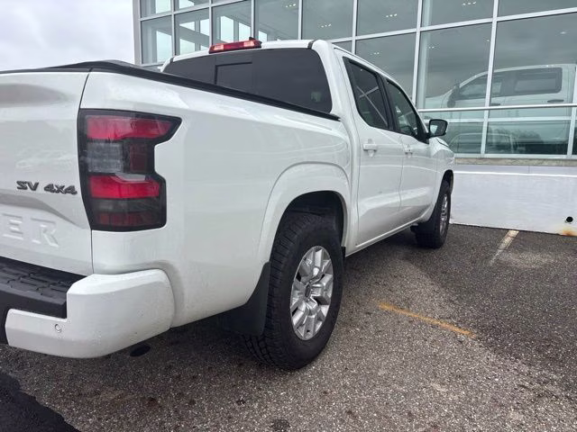 2023 Glacier White Nissan Frontier SV 4X4 Truck