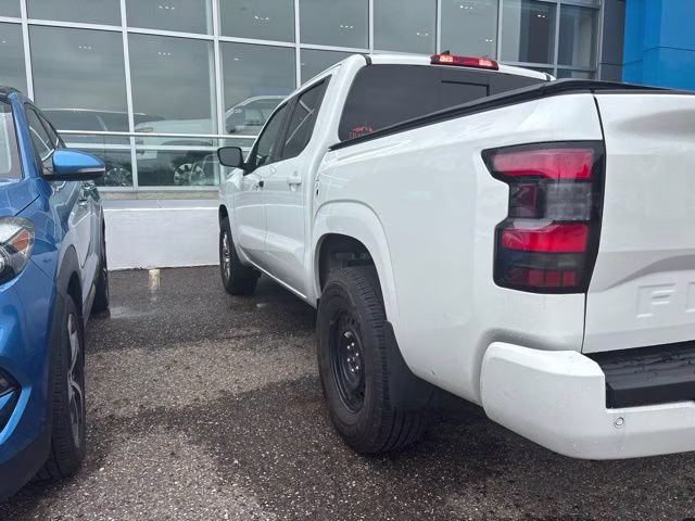 2023 Glacier White Nissan Frontier SV 4X4 Truck