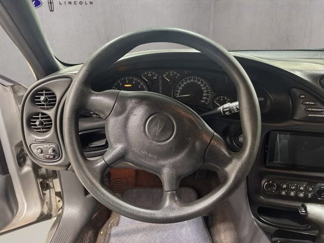 2004 Liquid Silver Metallic Pontiac Bonneville SE FWD Sedan