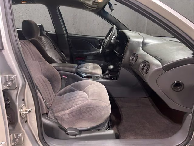 2004 Liquid Silver Metallic Pontiac Bonneville SE FWD Sedan