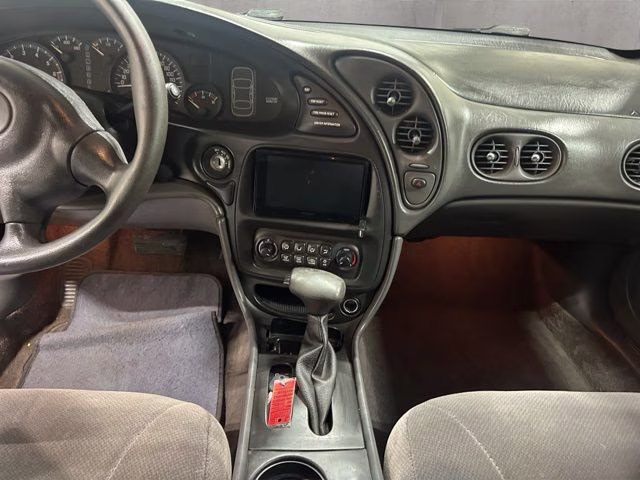 2004 Liquid Silver Metallic Pontiac Bonneville SE FWD Sedan