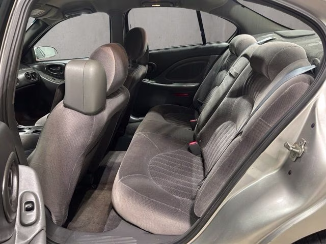 2004 Liquid Silver Metallic Pontiac Bonneville SE FWD Sedan