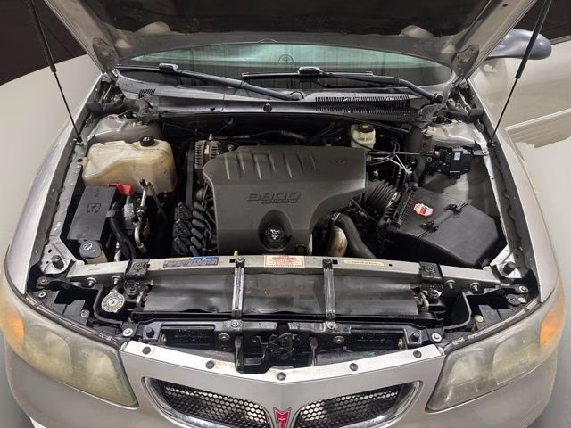 2004 Liquid Silver Metallic Pontiac Bonneville SE FWD Sedan
