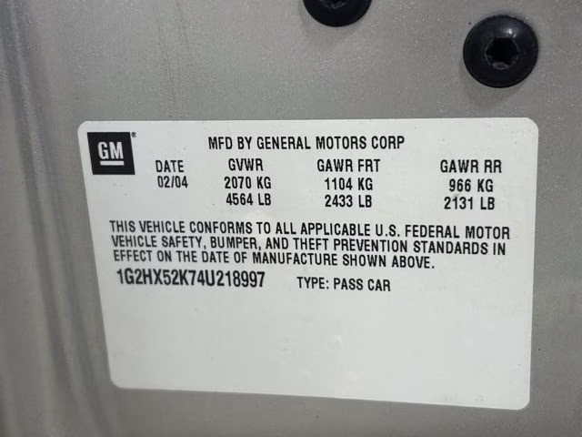 2004 Liquid Silver Metallic Pontiac Bonneville SE FWD Sedan