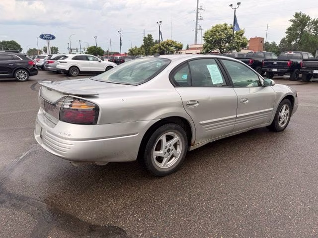 2004 Liquid Silver Metallic Pontiac Bonneville SE FWD Sedan