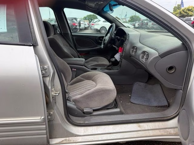 2004 Liquid Silver Metallic Pontiac Bonneville SE FWD Sedan