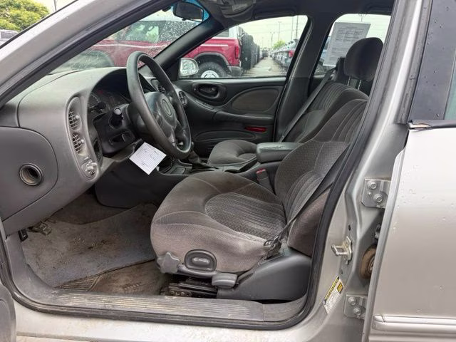 2004 Liquid Silver Metallic Pontiac Bonneville SE FWD Sedan