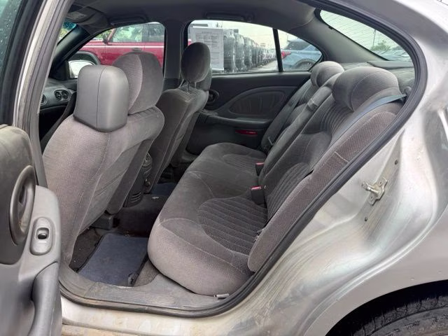 2004 Liquid Silver Metallic Pontiac Bonneville SE FWD Sedan