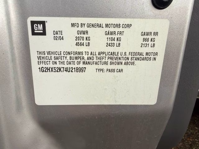 2004 Liquid Silver Metallic Pontiac Bonneville SE FWD Sedan