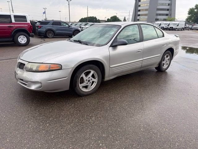 2004 Liquid Silver Metallic Pontiac Bonneville SE FWD Sedan