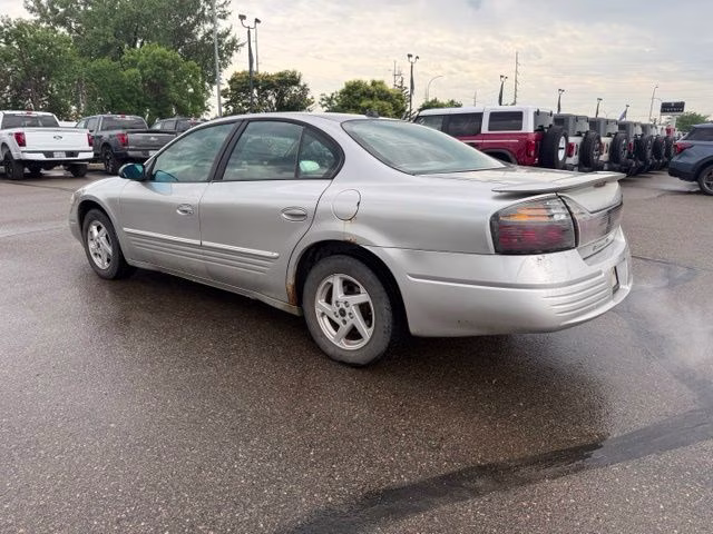 2004 Liquid Silver Metallic Pontiac Bonneville SE FWD Sedan