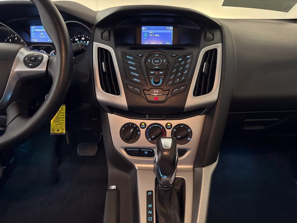 2014 Blue Metallic Ford Focus SE FWD Hatchback