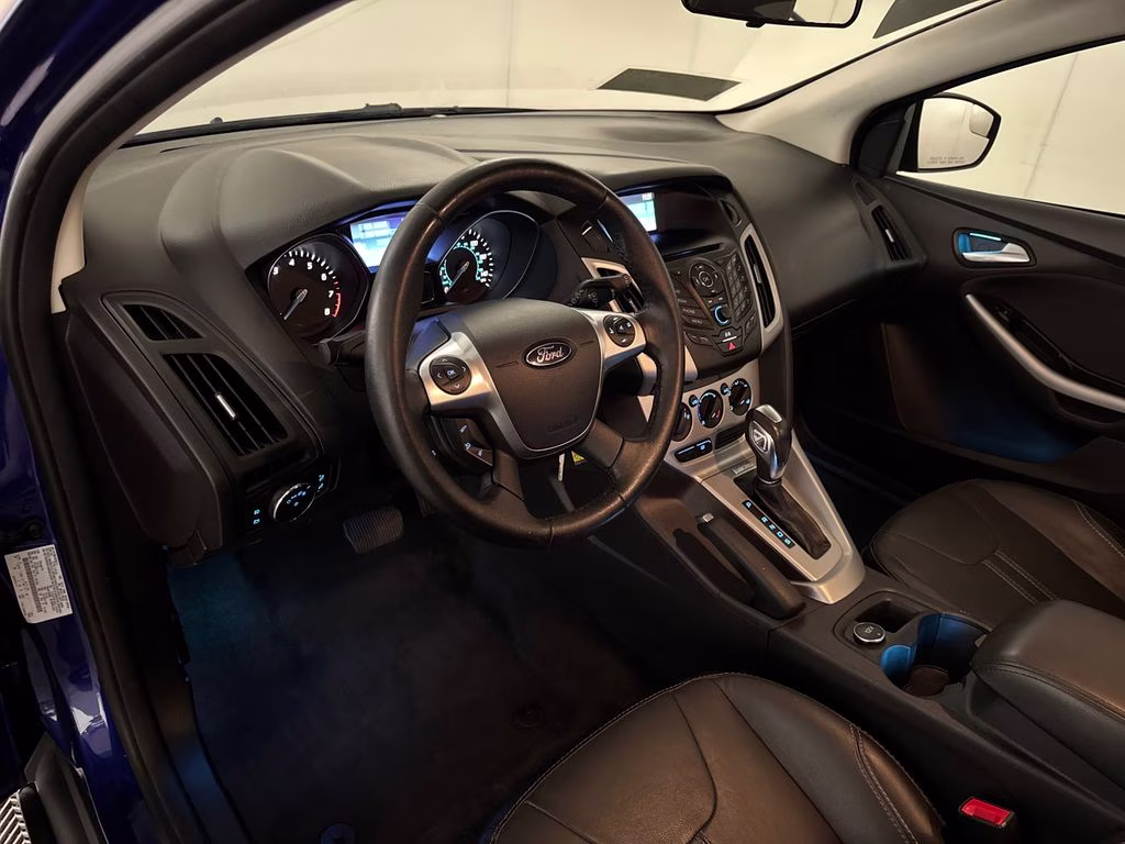 2014 Blue Metallic Ford Focus SE FWD Hatchback