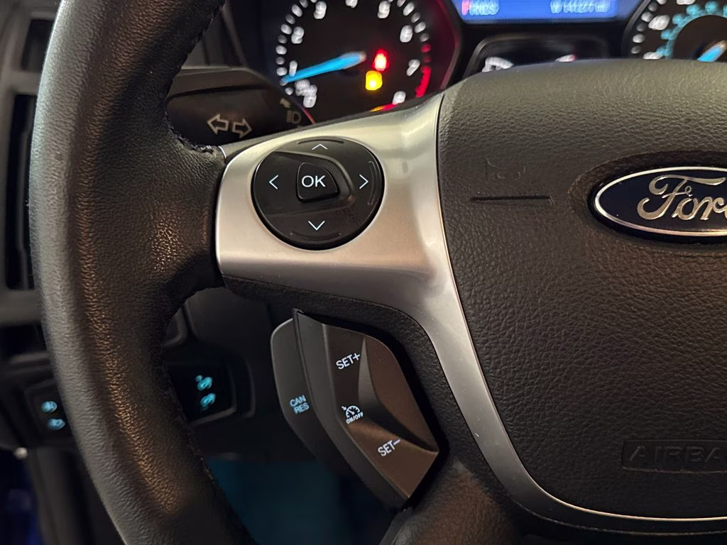 2014 Performance Blue Metallic Ford Focus SE FWD Hatchback