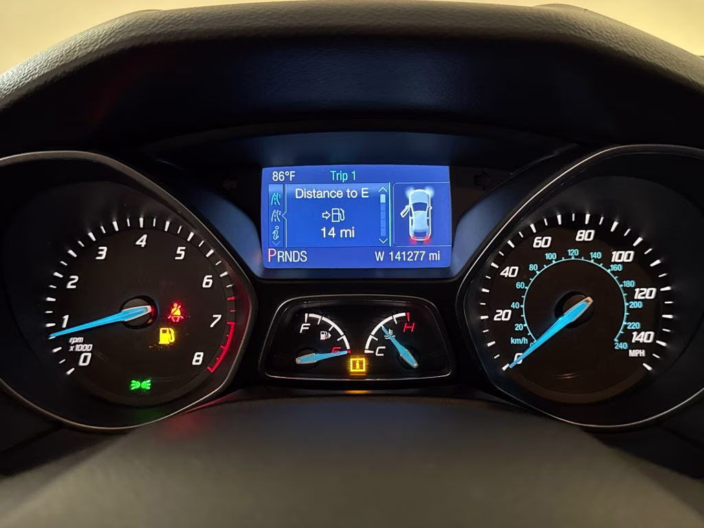 2014 Performance Blue Metallic Ford Focus SE FWD Hatchback