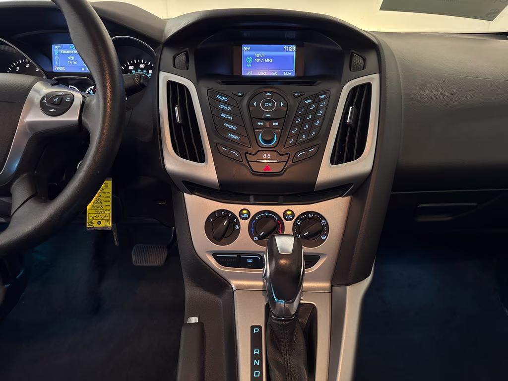 2014 Performance Blue Metallic Ford Focus SE FWD Hatchback