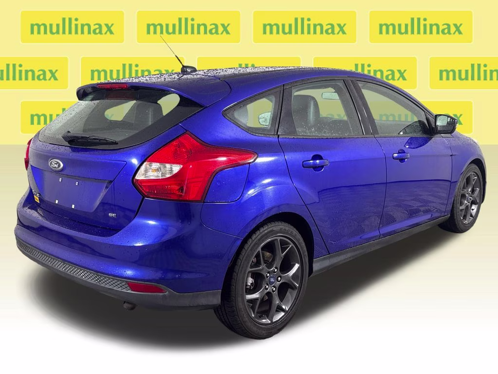 2014 Performance Blue Metallic Ford Focus SE FWD Hatchback