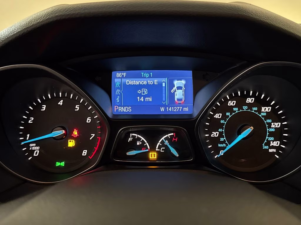 2014 Blue Metallic Ford Focus SE FWD Hatchback