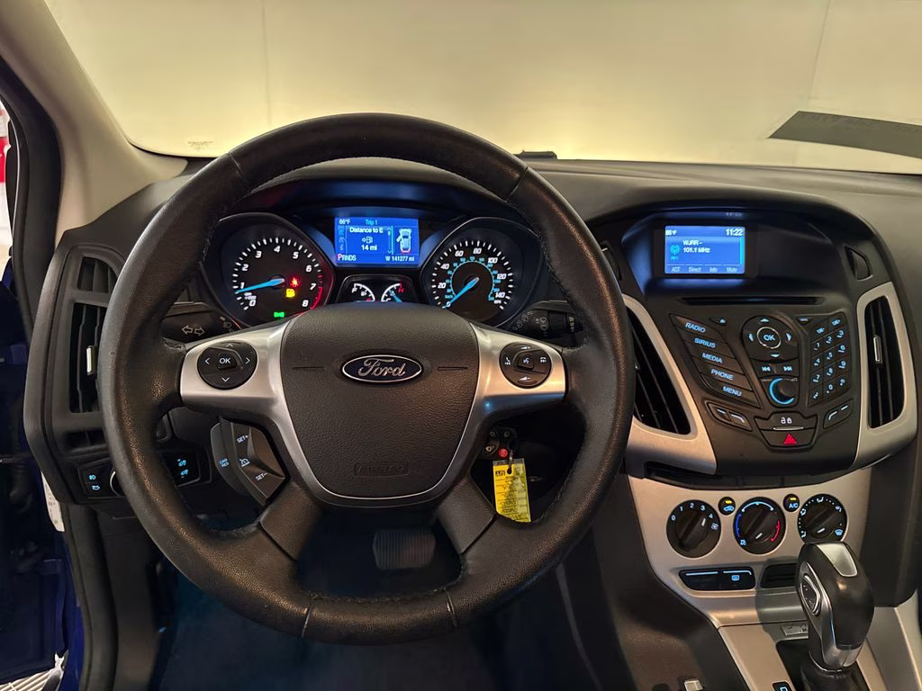 2014 Performance Blue Metallic Ford Focus SE FWD Hatchback