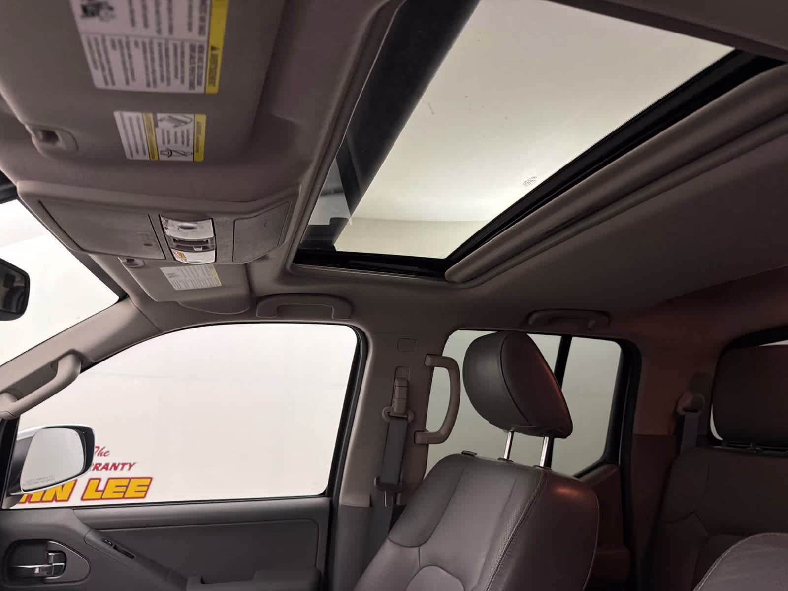 2015 Glacier White Nissan Frontier SL RWD Truck