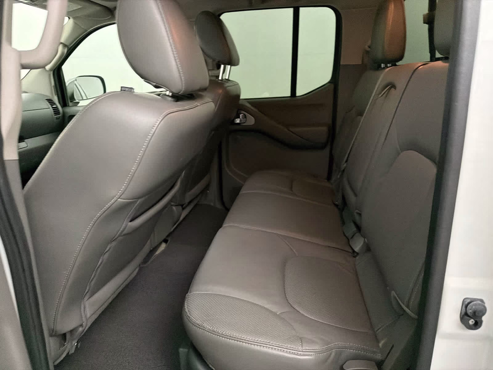 2015 Glacier White Nissan Frontier SL RWD Truck