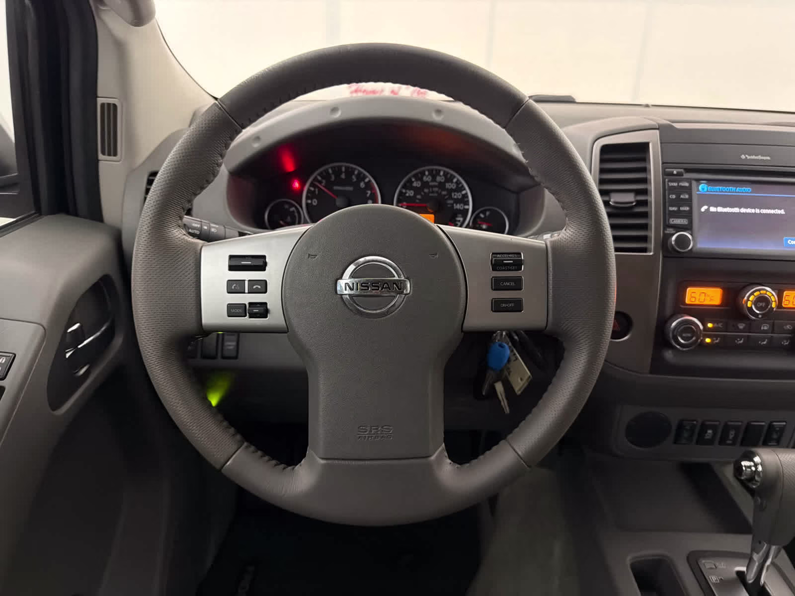 2015 Glacier White Nissan Frontier SL RWD Truck