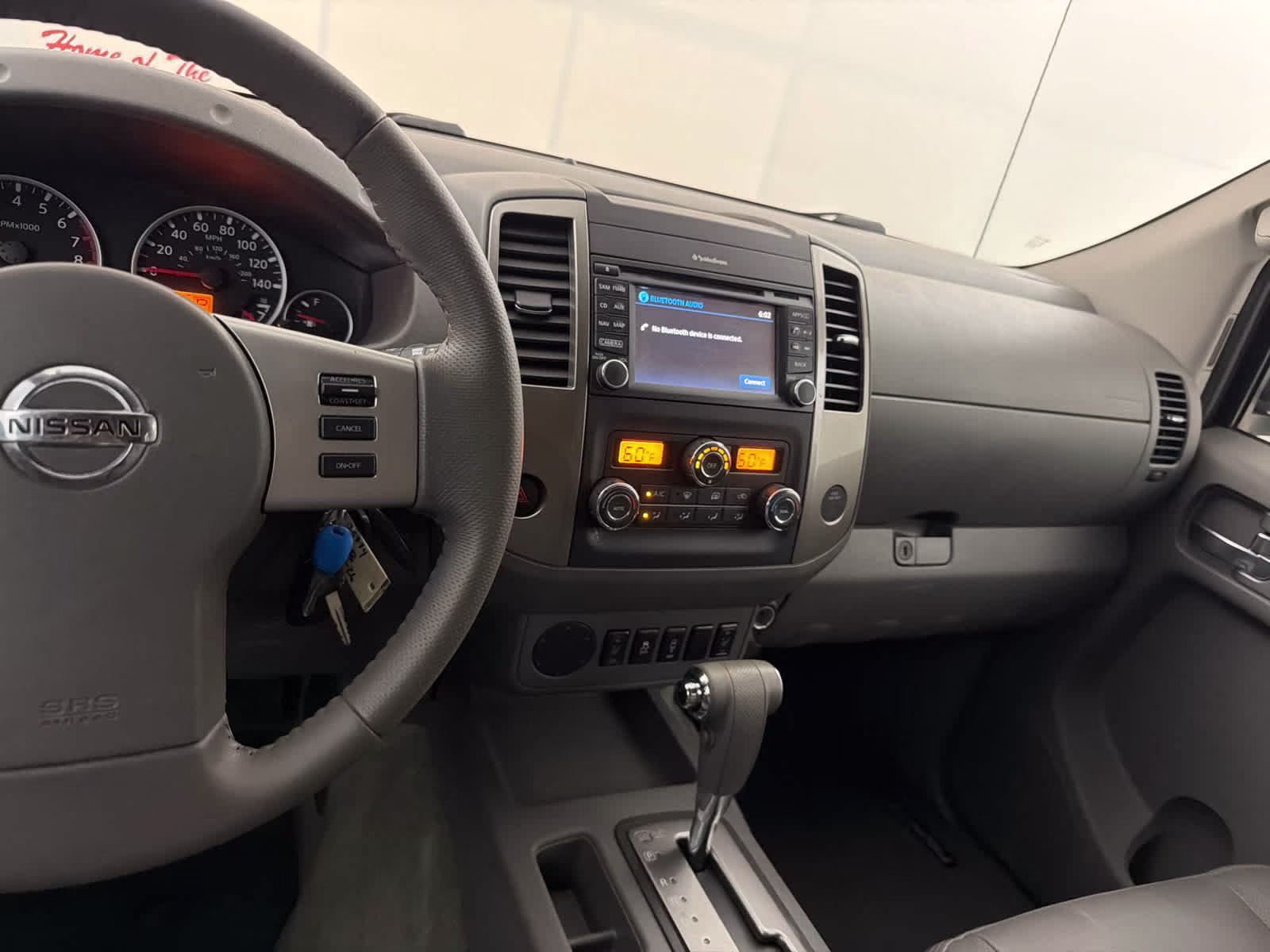 2015 Glacier White Nissan Frontier SL RWD Truck