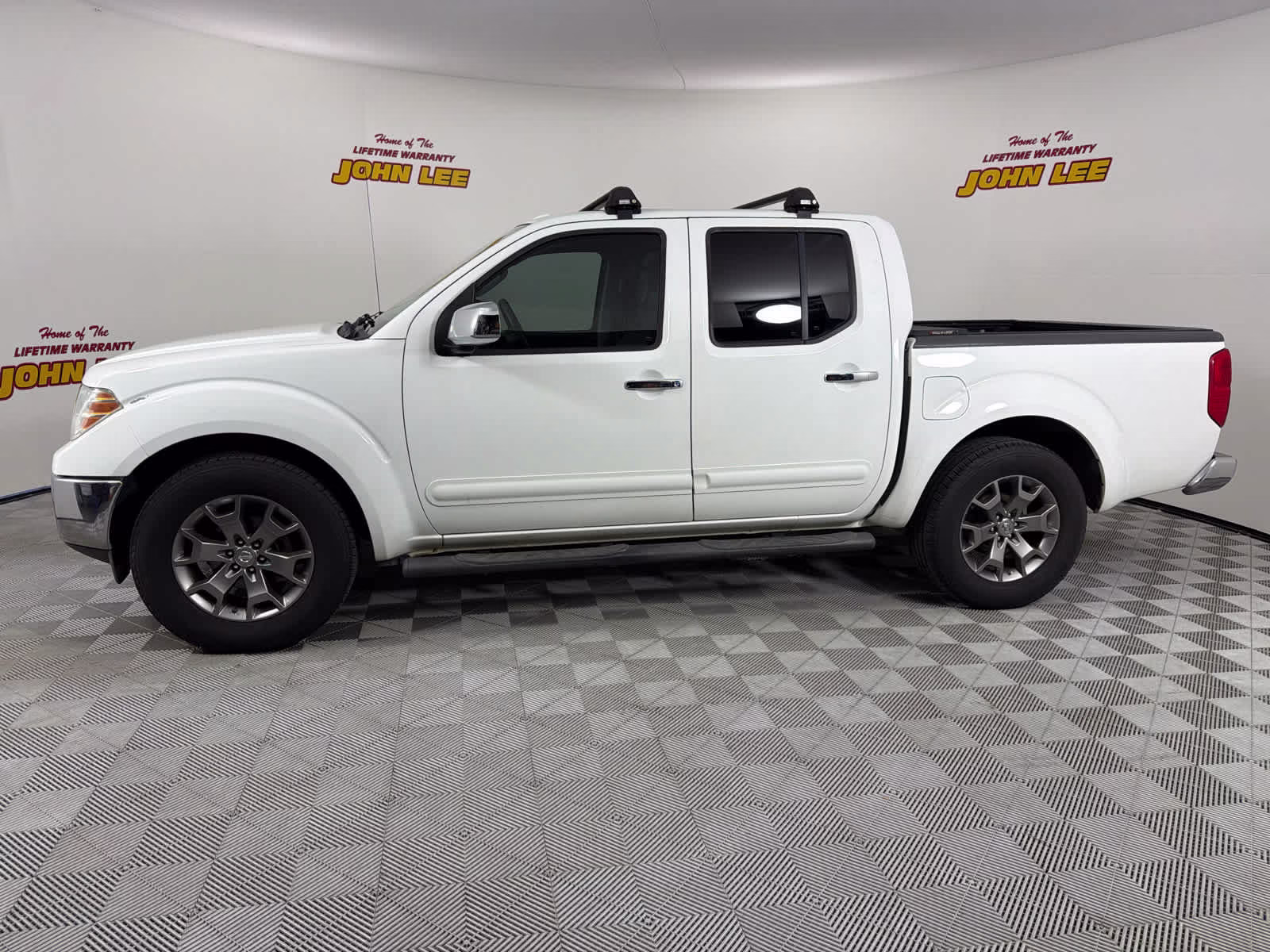 2015 Glacier White Nissan Frontier SL RWD Truck