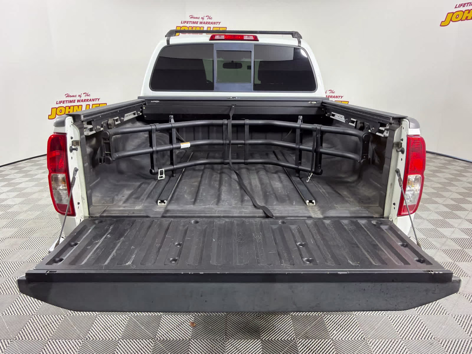 2015 Glacier White Nissan Frontier SL RWD Truck