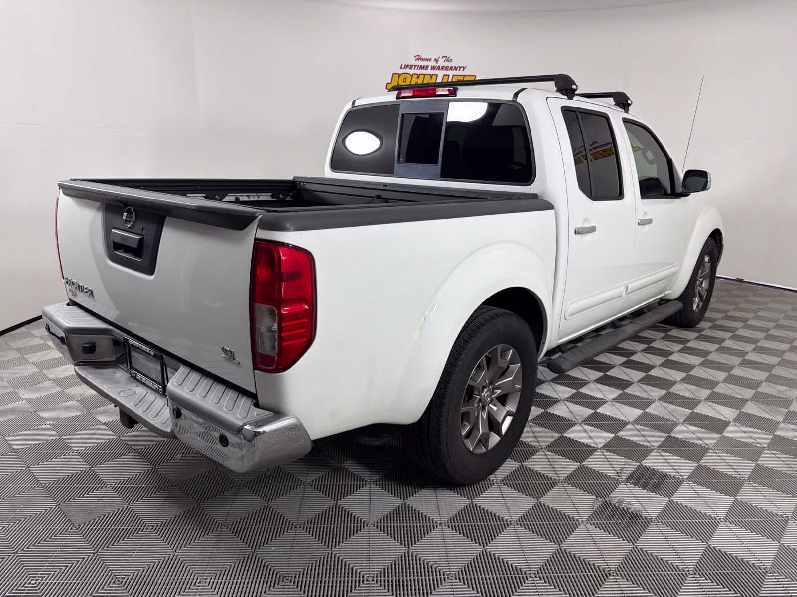 2015 Glacier White Nissan Frontier SL RWD Truck