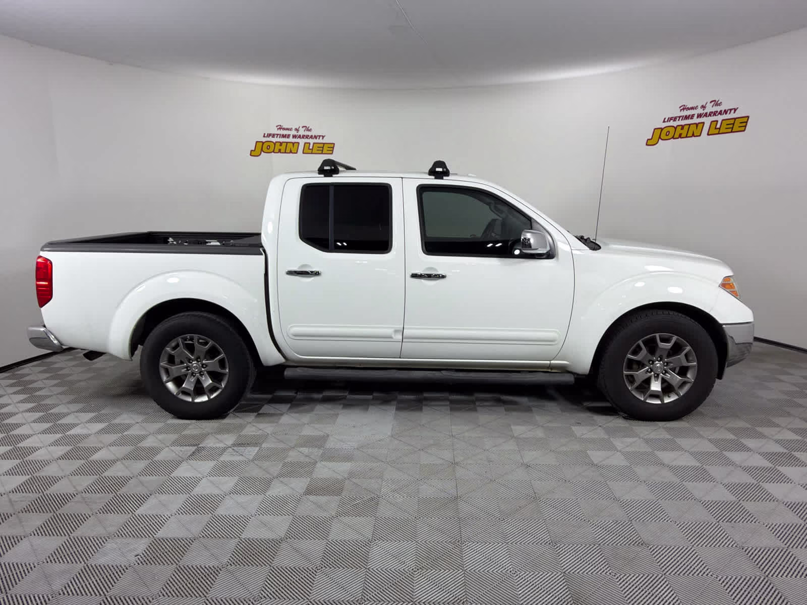 2015 Glacier White Nissan Frontier SL RWD Truck