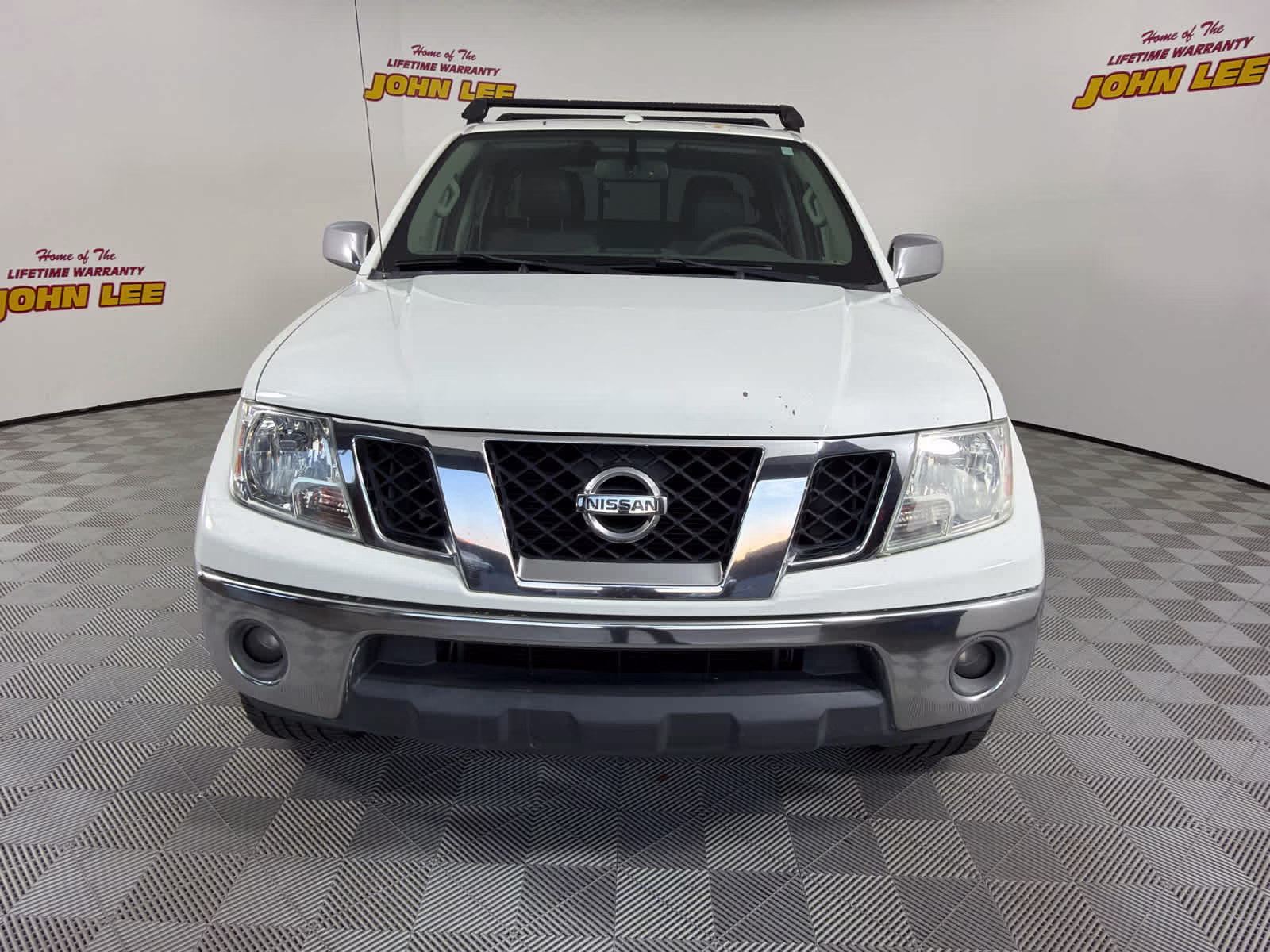 2015 Glacier White Nissan Frontier SL RWD Truck