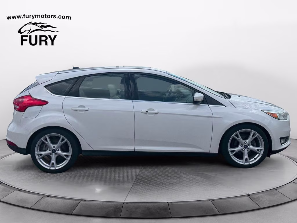 2015 White Platinum Clearcoat Metallic Ford Focus Titanium FWD Hatchback