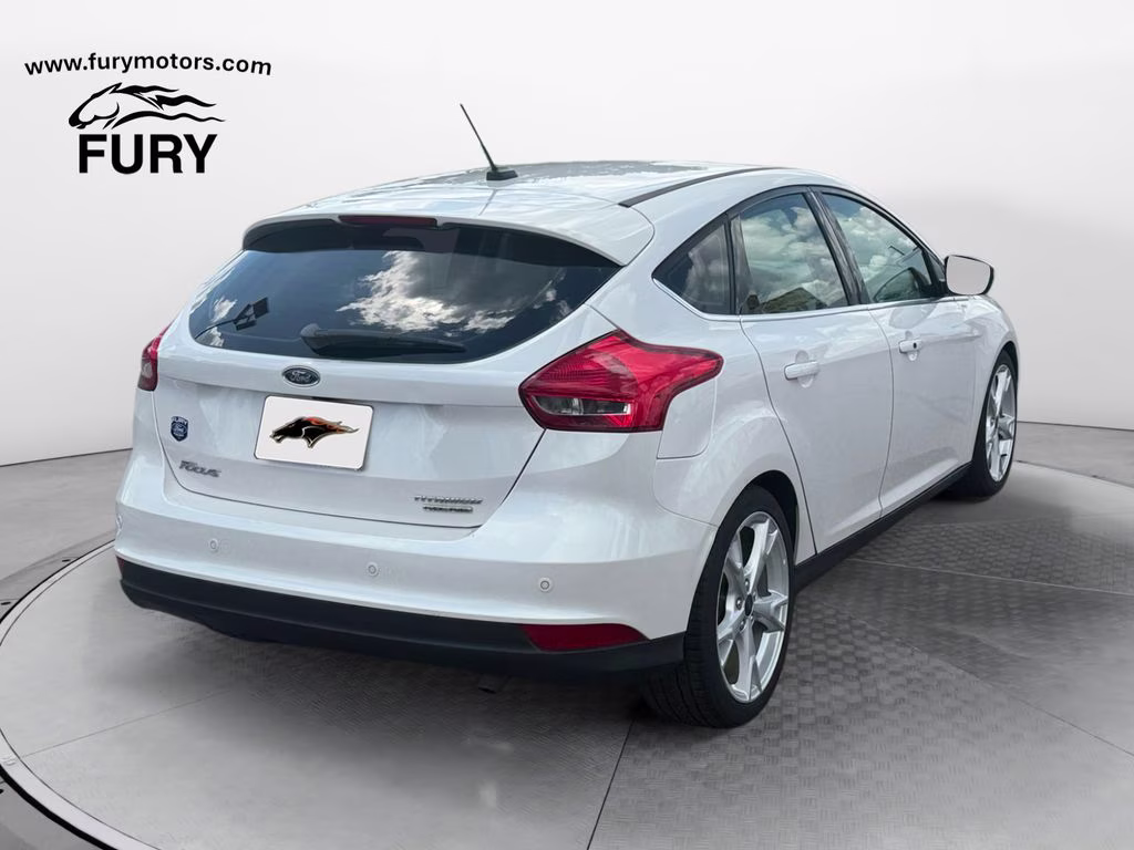 2015 White Platinum Clearcoat Metallic Ford Focus Titanium FWD Hatchback