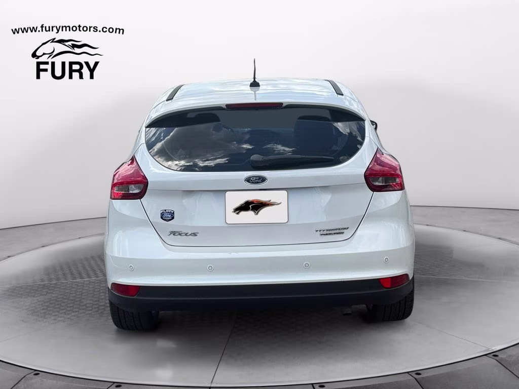 2015 White Platinum Clearcoat Metallic Ford Focus Titanium FWD Hatchback