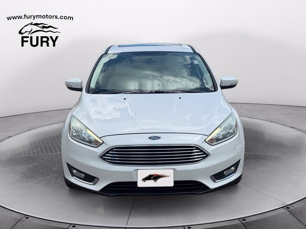 2015 White Platinum Clearcoat Metallic Ford Focus Titanium FWD Hatchback