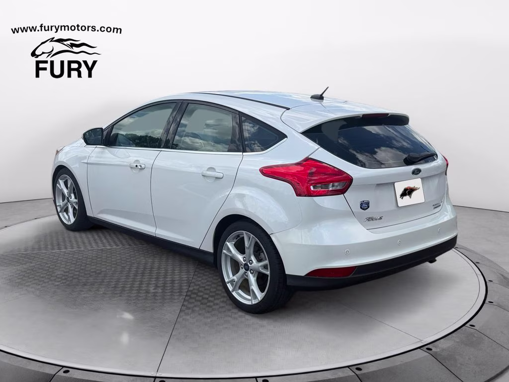 2015 White Platinum Clearcoat Metallic Ford Focus Titanium FWD Hatchback