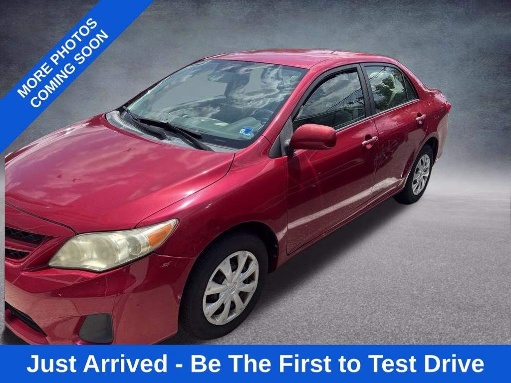 2011 Red Toyota Corolla Base FWD Sedan