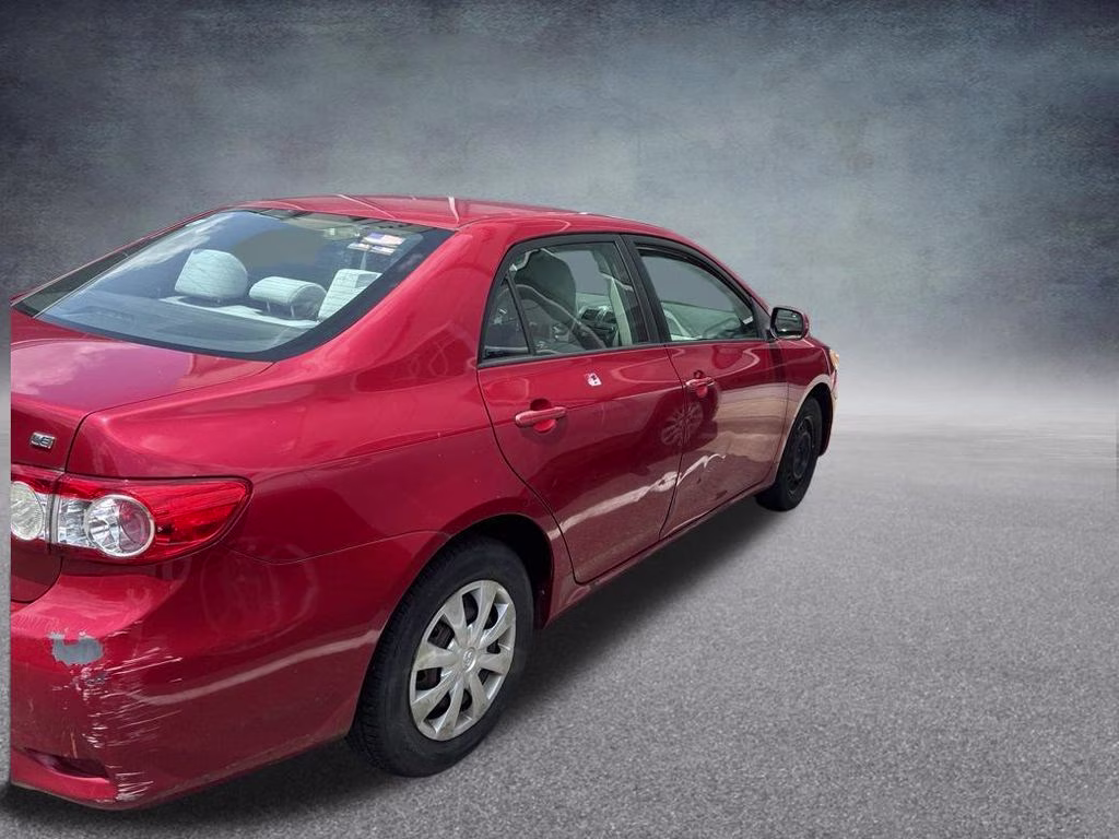 2011 Red Toyota Corolla Base FWD Sedan