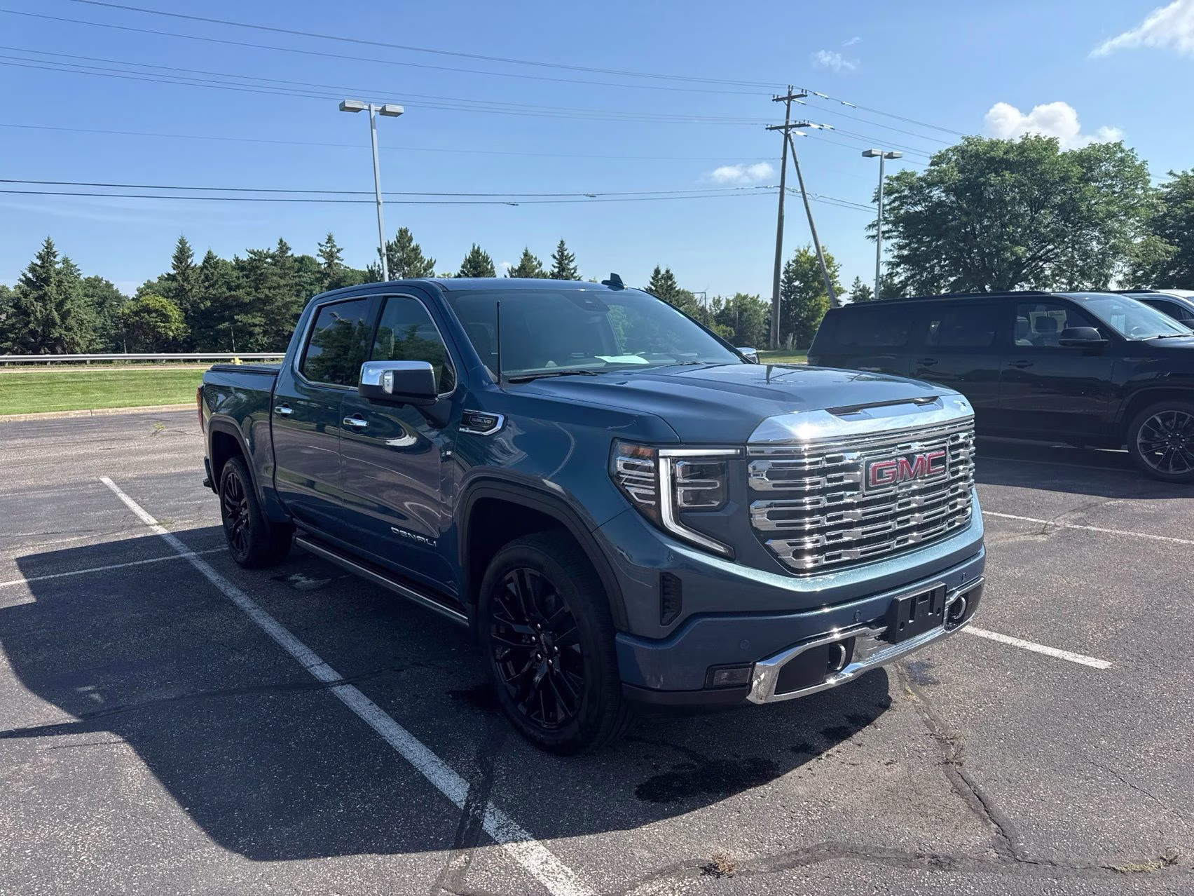 2024 Downpour Metallic GMC Sierra 1500 Denali 4X4 Truck