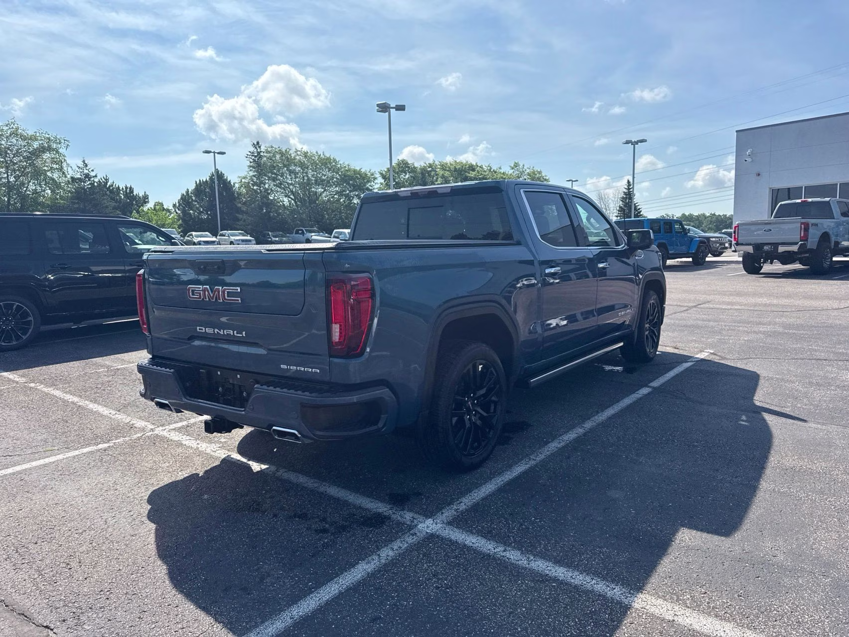 2024 Downpour Metallic GMC Sierra 1500 Denali 4X4 Truck