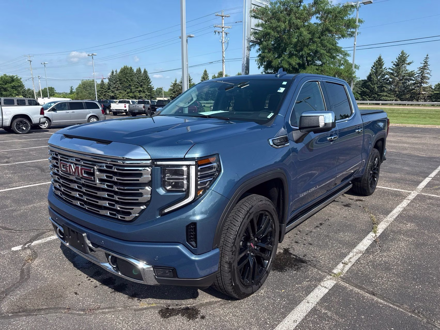 2024 Downpour Metallic GMC Sierra 1500 Denali 4X4 Truck